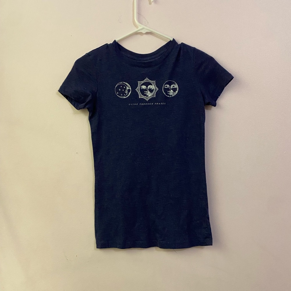blue t-shirt with letting “going through phases”